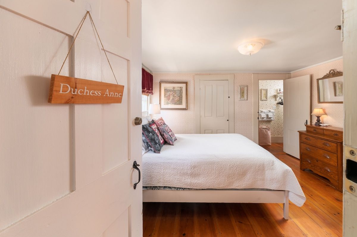 Spacious master bedroom with king bed and mountain views