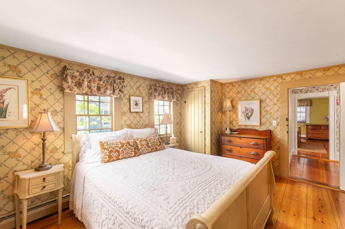 Spacious master bedroom with king bed and mountain views