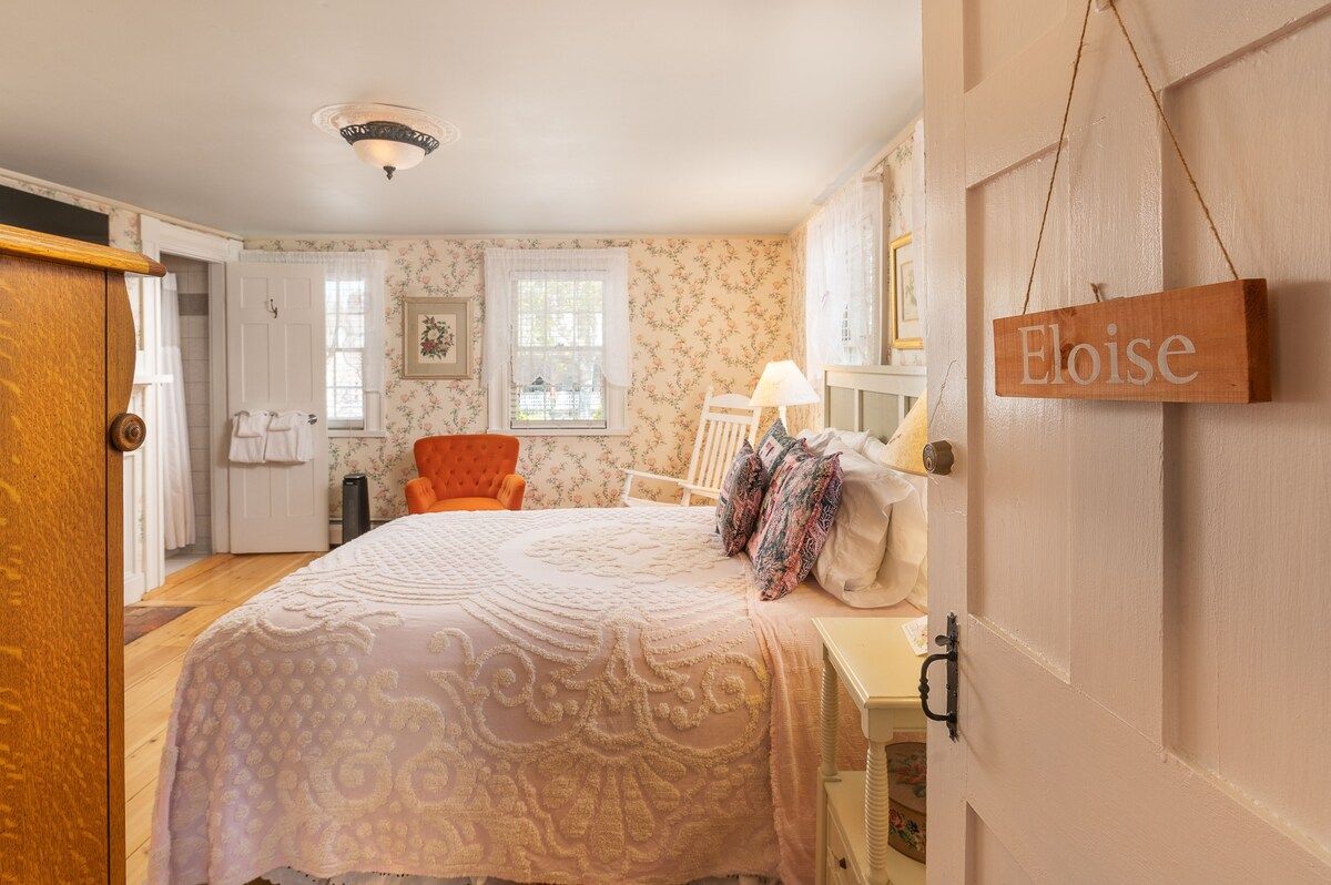Cozy bedroom with a king bed and a vintage feel