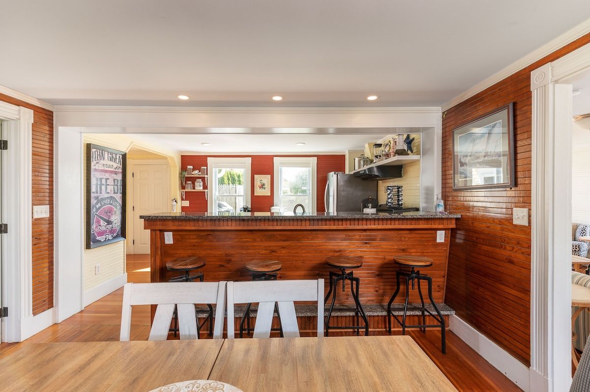 A well-equipped kitchen with a large island, stainless steel appliances, and plenty of counter space.