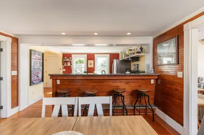 A well-equipped kitchen with a large island, stainless steel appliances, and plenty of counter space.