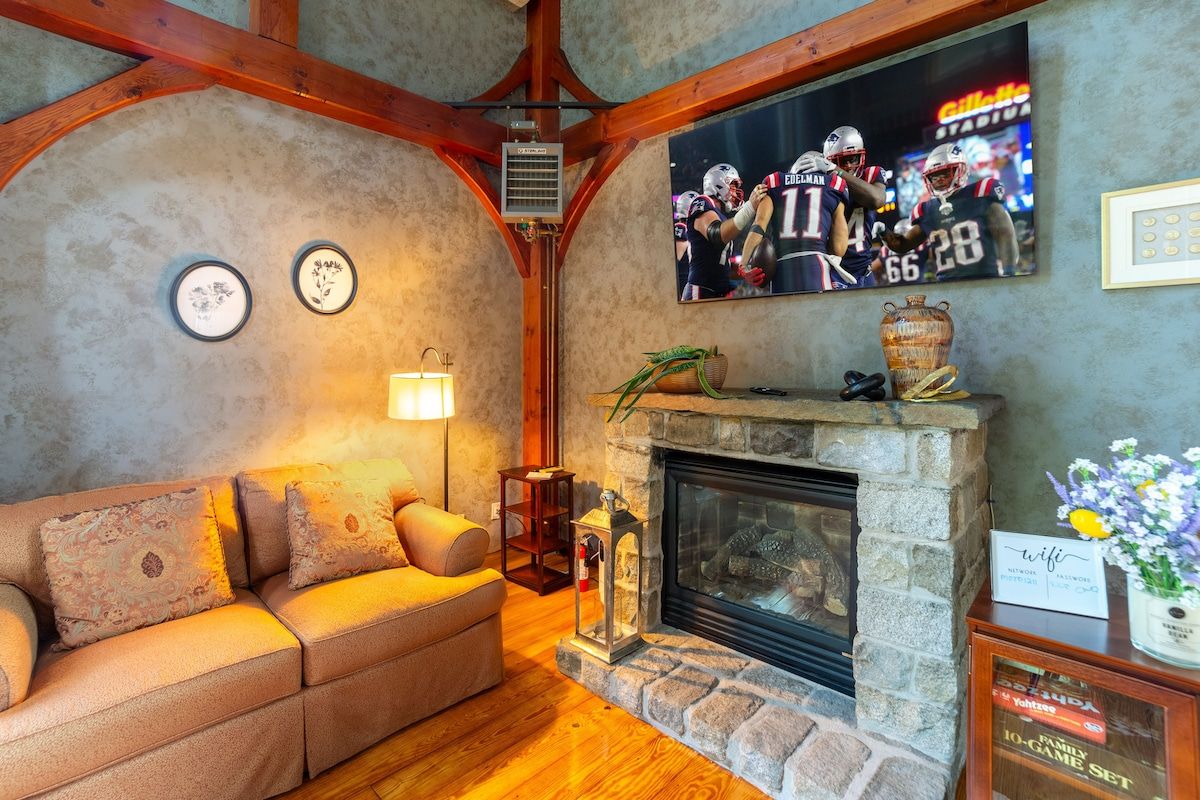 Cozy living room with a fireplace and TV, perfect for relaxing after a long day.