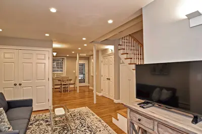 Cozy living room with a TV and comfortable seating area